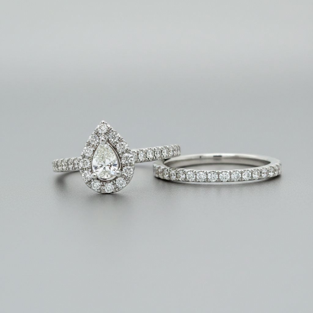 14K White Gold 1.00 Carat Total Weight Diamond Pear-Shaped Halo Bridal Wedding Engagement Ring Set with Peekaboo Diamond in Gallery of Rin