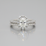 14K White Gold 1.00 Carat Total Weight Oval Halo Diamond Bridal Wedding Engagement Ring Set with .25CT 5x3mm Diamond Center and Peekaboo Diamond in the Gallery of Ring.