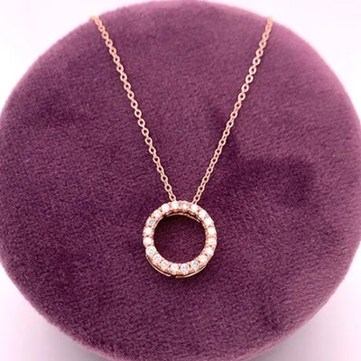 14K Rose Gold .16 Carat Total Weight (20) Diamond Open Circle Pendant Necklace