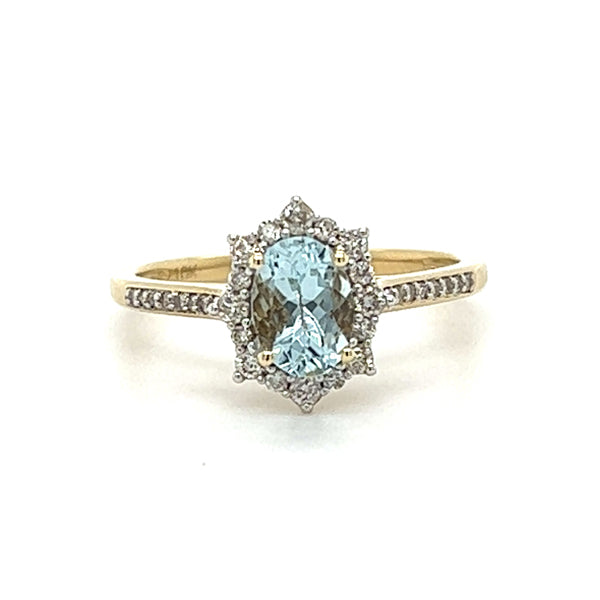 10K Yellow Gold 7x5 Oval Aquamarine and 1/4 Carat Total Weight Diamond Ring