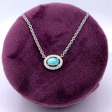 14K White Gold .29CT Opal and 1/8 Carat Total Weight (16 Brilliant) Diamond Pendant