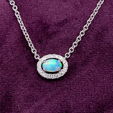 14K White Gold .29CT Opal and 1/8 Carat Total Weight (16 Brilliant) Diamond Pendant