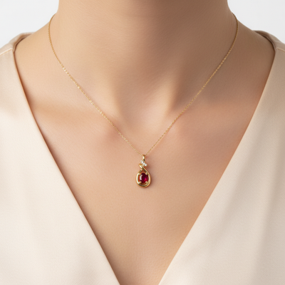 14K Yellow Gold 0.34CT 4x5mm Oval Ruby and 0.02 Carat Total Weight (4) Diamond Pendant