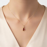 14K Yellow Gold 0.34CT 4x5mm Oval Ruby and 0.02 Carat Total Weight (4) Diamond Pendant