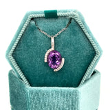 Silver Oval Amethyst and White Cubic Zirconia Partial Bezel Set Pendant Necklace
