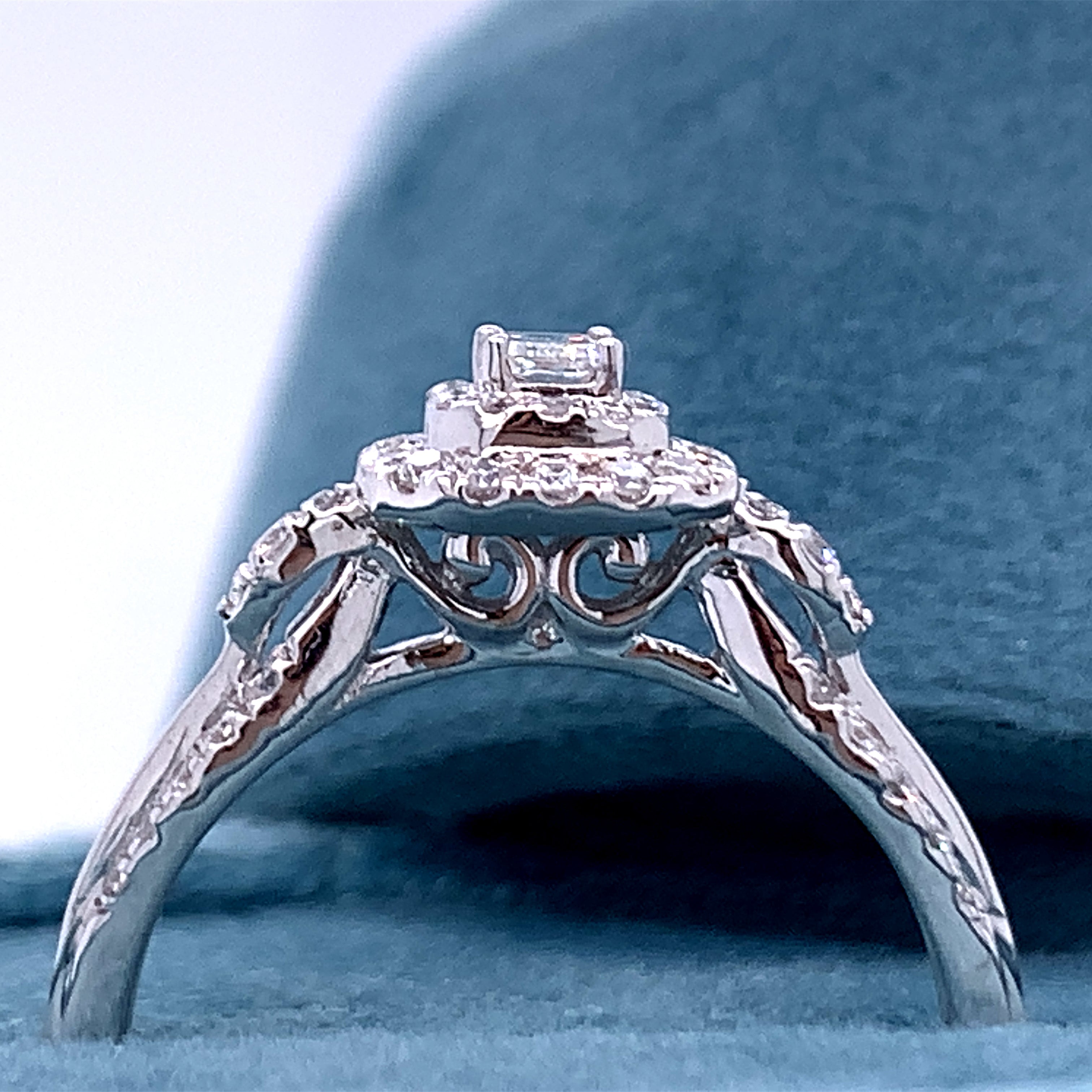 14K White Gold 1/2 Carat Total Weight 1/6CT Center Emerald Cut Diamond Engagement Ring