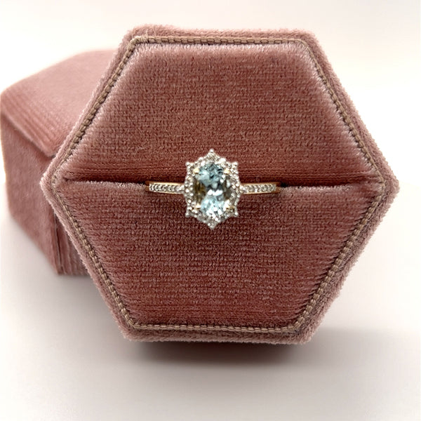 10K Yellow Gold 7x5 Oval Aquamarine and 1/4 Carat Total Weight Diamond Ring