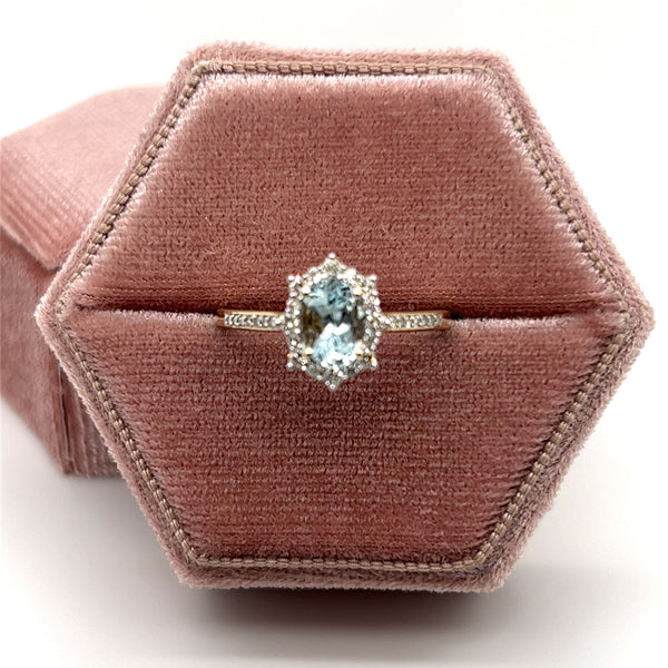 10K Yellow Gold 7x5 Oval Aquamarine and 1/4 Carat Total Weight Diamond Ring