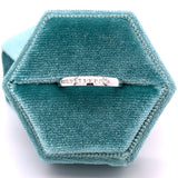 14K White Gold .10 Carat Total Weight Diamond Channel Set Band