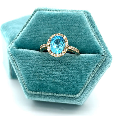 14K Yellow Gold 2CT Checkerboard Cut Oval Blue Topaz and .24 Carat Total Weight Diamond Ring