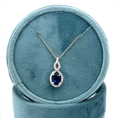 14K White Gold 0.6CT Oval Sapphire and Diamond Pendant