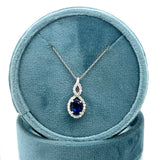 14K White Gold 0.6CT Oval Sapphire and Diamond Pendant