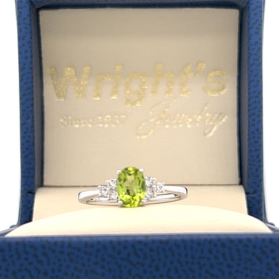 14K White Gold .94CT Oval Peridot and .15 Carat Total Weight (6) Diamond Ring