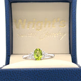 14K White Gold .94CT Oval Peridot and .15 Carat Total Weight (6) Diamond Ring