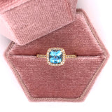 10K Yellow Gold .92CT Cushion Cut Blue Topaz and .13 Carat Total Weight Diamond Ring