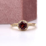 10K Yellow Gold .80CT Round Garnet and .13 Carat Total Weight Diamond Ring