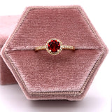 10K Yellow Gold .80CT Round Garnet and .13 Carat Total Weight Diamond Ring