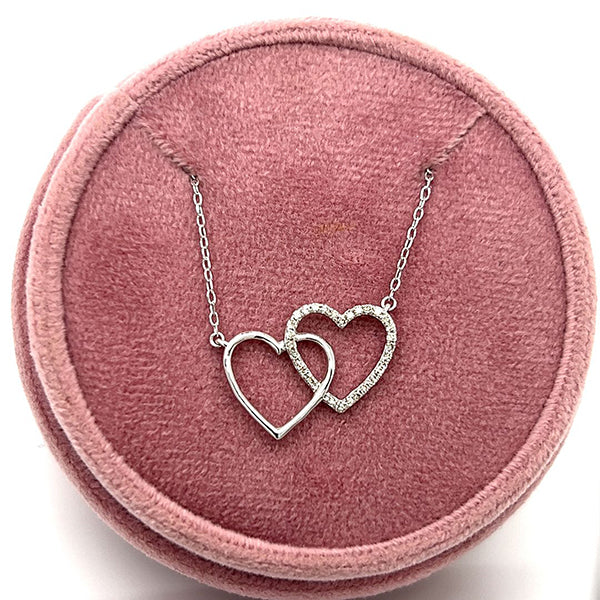 Sterling Silver Double Interlocking Heart Pendant with 1/10 CTW Diamonds