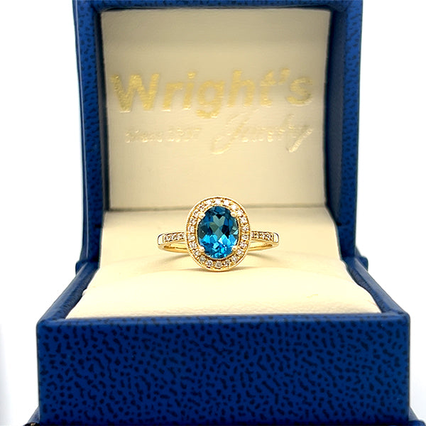 10K Yellow Gold London Blue Topaz and 0.15 Carat Total Weight Diamond Ring