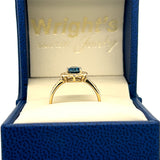 10K Yellow Gold London Blue Topaz and 0.15 Carat Total Weight Diamond Ring