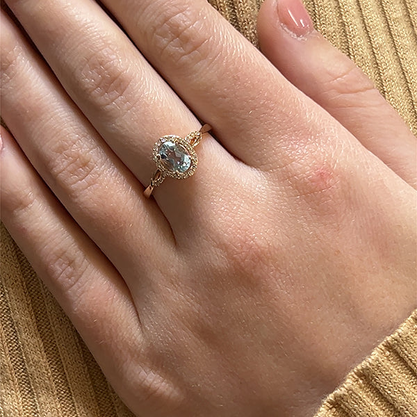14K Rose Gold Oval Aquamarine and 0.13 Carat Total Weight Diamond Ring