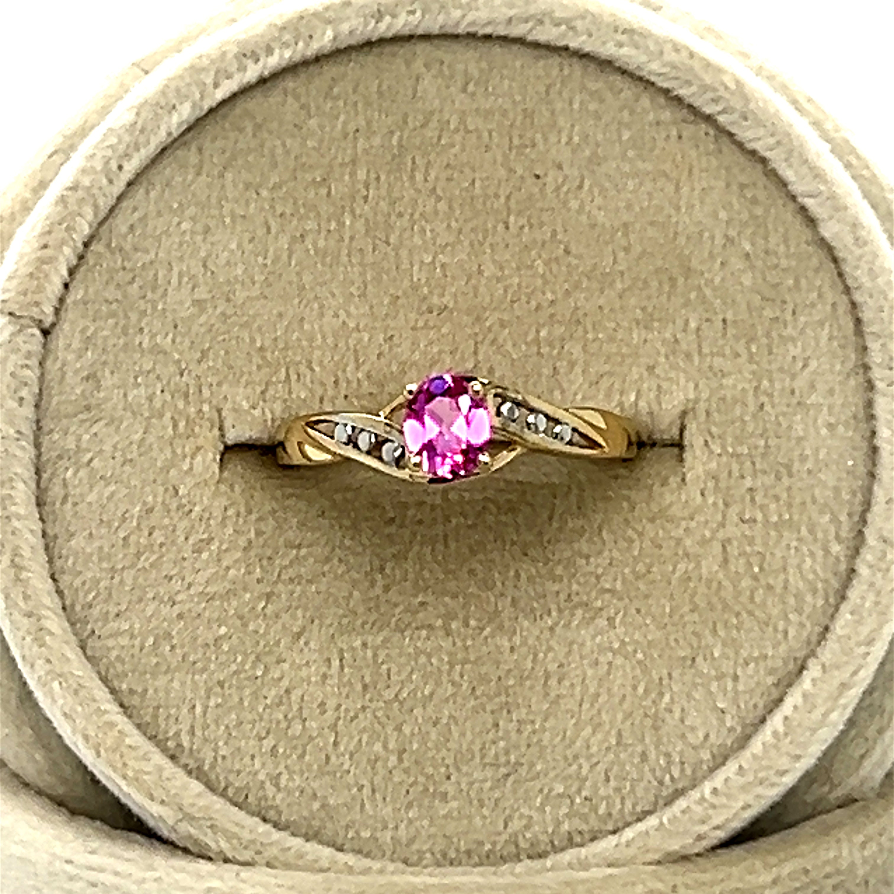 10K Yellow Gold Oval Pink Topaz Twist Band Ring