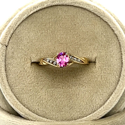 10K Yellow Gold Oval Pink Topaz Twist Band Ring