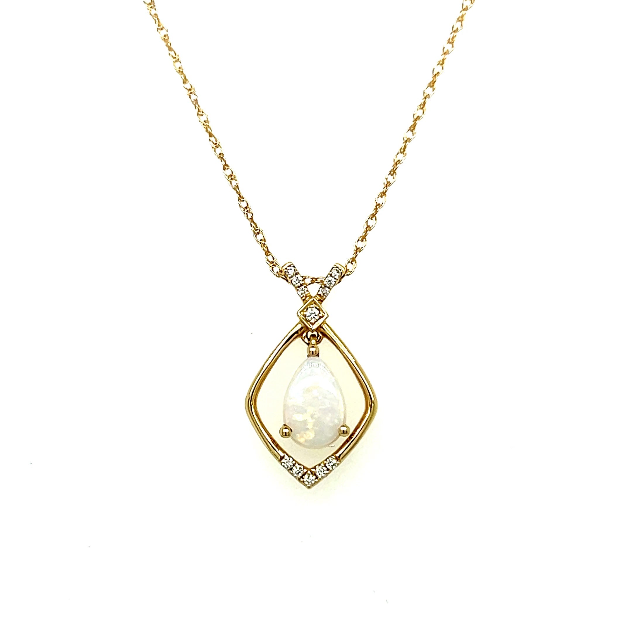 14K Yellow Gold 6x9mm 0.72CT Opal and 0.078 Carat Total Weight (12) Diamond Pendant