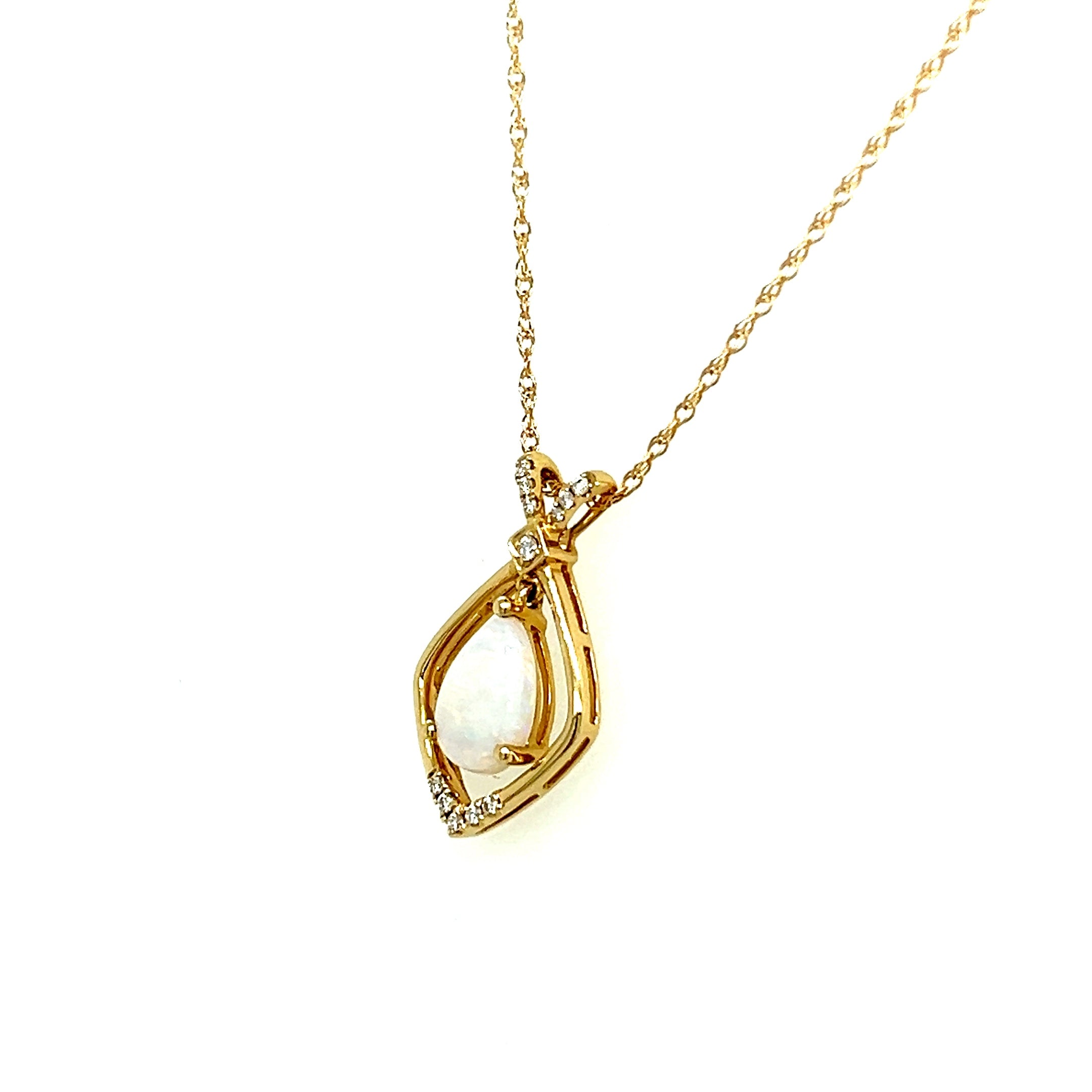 14K Yellow Gold 6x9mm 0.72CT Opal and 0.078 Carat Total Weight (12) Diamond Pendant
