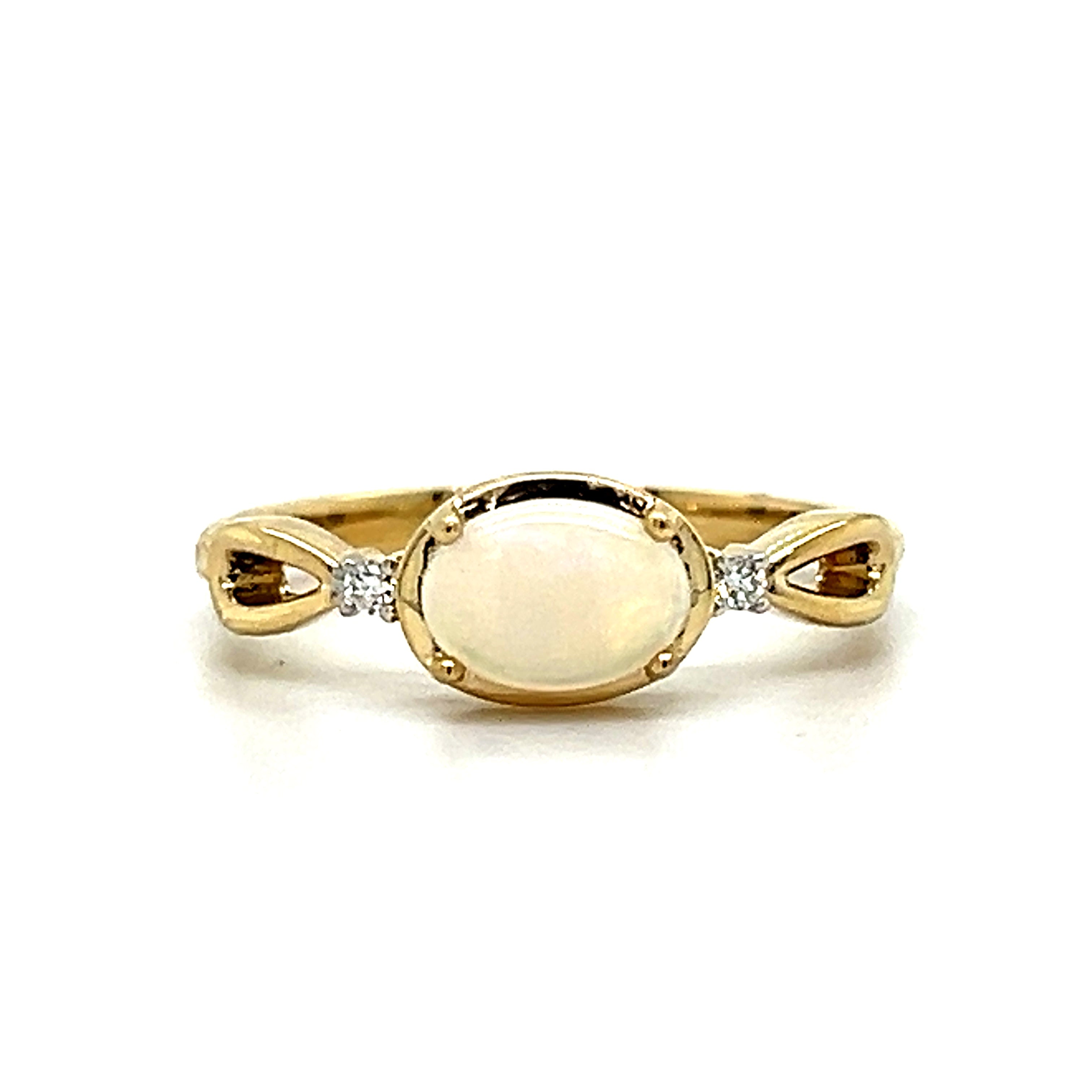 10K Yellow Gold Oval Opal and .3 Carat Total Weight Diamond Ring