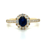 14K Yellow Gold .16CT Oval Sapphire .36 Carat Total Weight Baguette Diamond and Round Diamond Ring