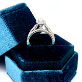 14K White Gold 1.00 Carat Total Weight Oval Halo Diamond Bridal Wedding Engagement Ring Set with .25CT 5x3mm Diamond Center and Peekaboo Diamond in the Gallery of Ring.
