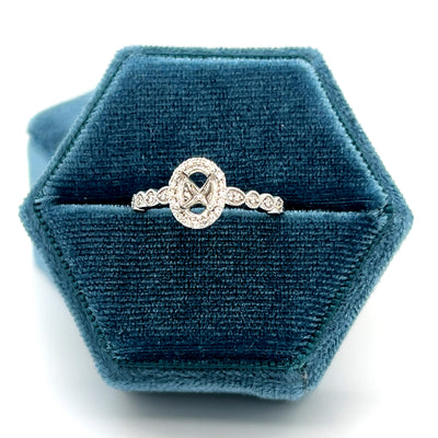 14K White Gold 1/6 Carat Total Weight Diamond 7x5 Oval Semi Mount Bridal Engagement Ring