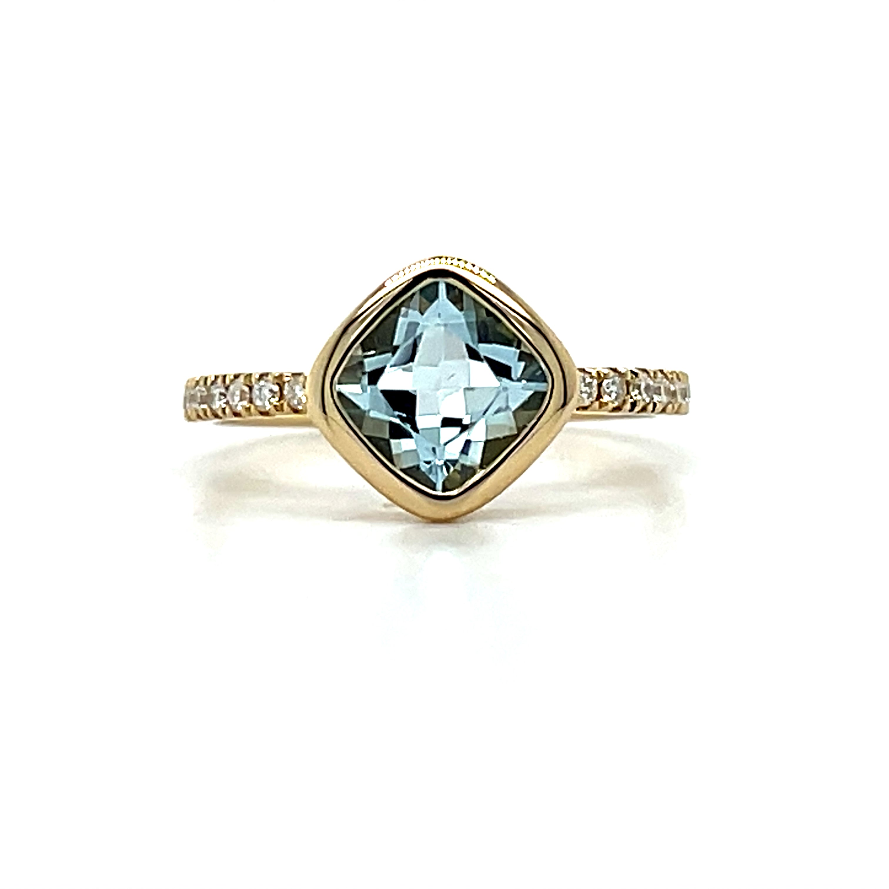 14K Yellow Gold 1.23CT Aquamarine and 0.13 Carat Total Weight Diamond Ring.