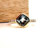 14K Yellow Gold 1.23CT Aquamarine and 0.13 Carat Total Weight Diamond Ring.