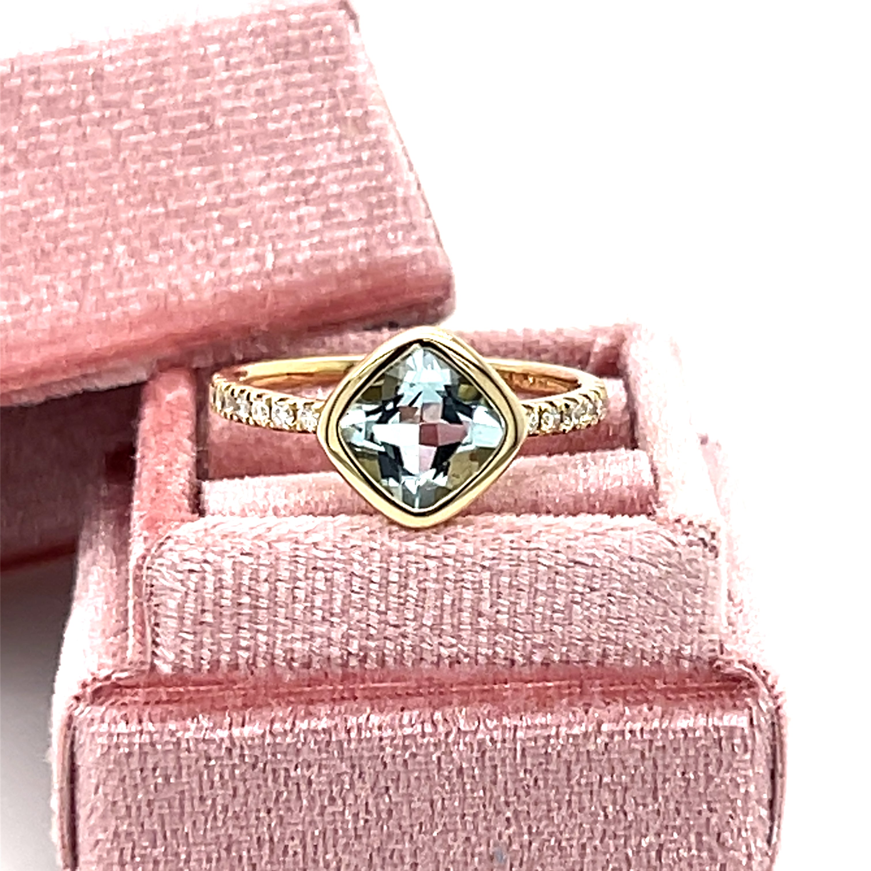 14K Yellow Gold 1.23CT Aquamarine and 0.13 Carat Total Weight Diamond Ring.