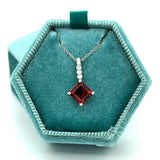 14K White Gold 1.80CT 7mm Garnet and 0.02 Carat Total Weight (3) Round Diamond Pendant