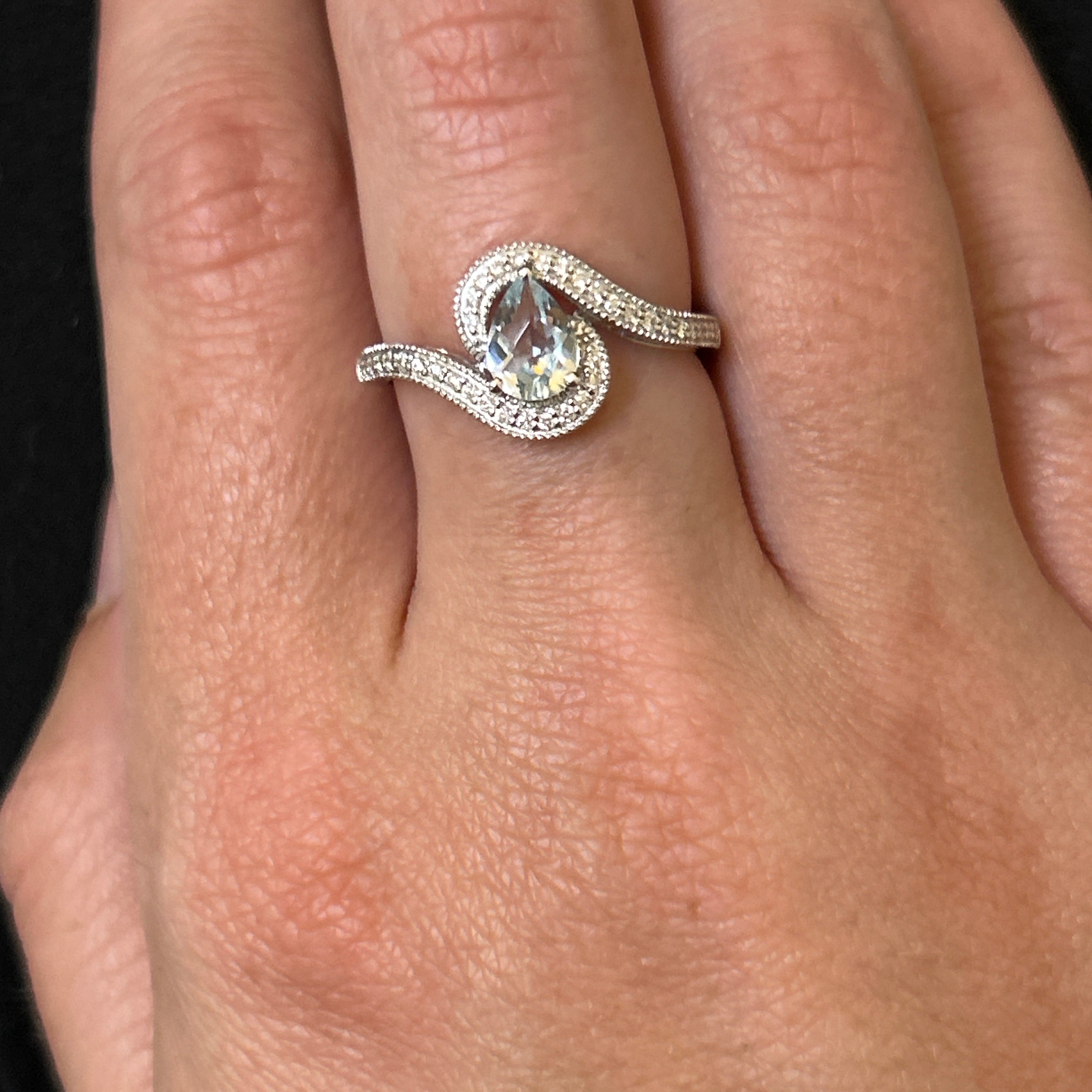 14K White Gold 0.57CT 5X7 Pear Aquamarine and 0.142 Carat Total Weight (36) Round Diamond Ring