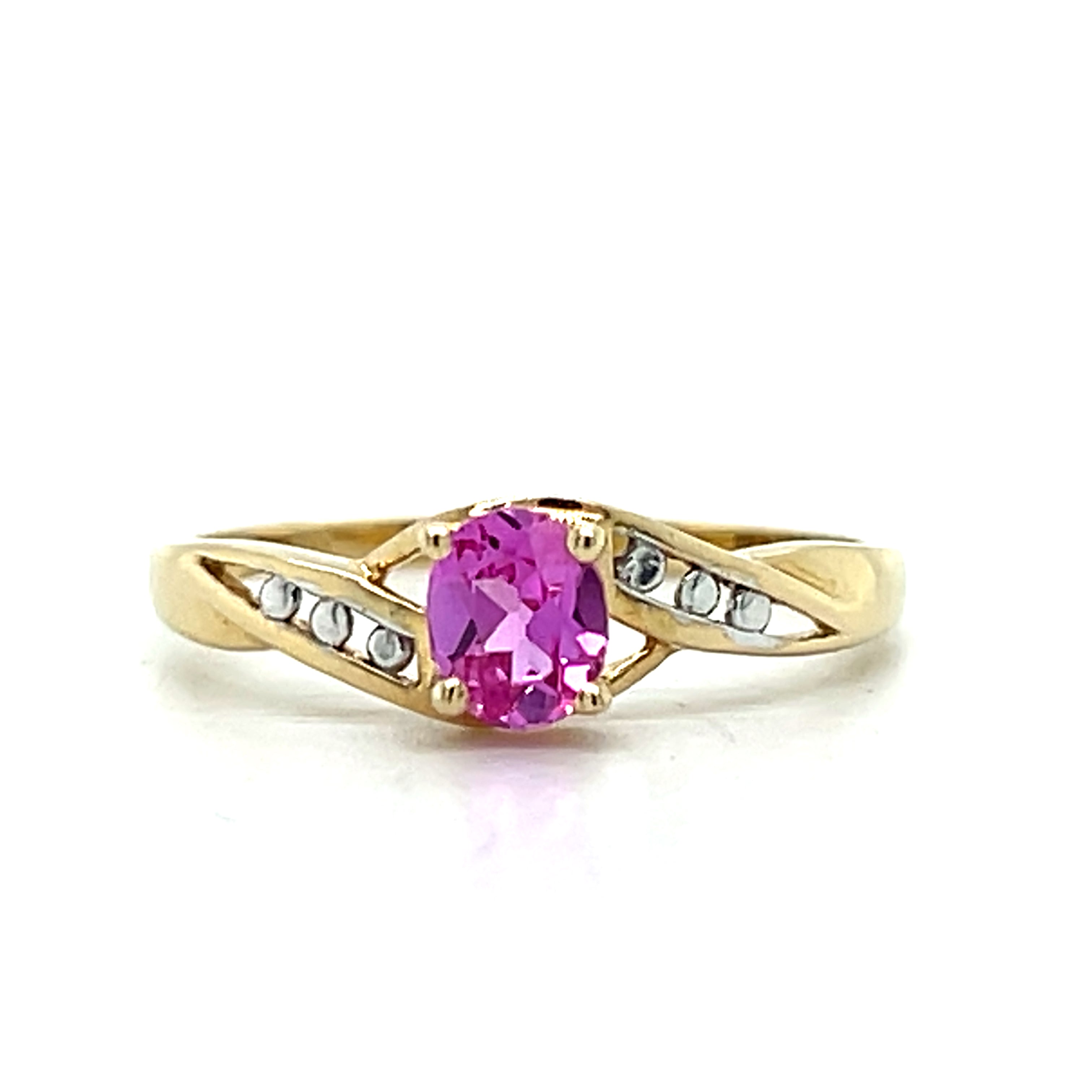 10K Yellow Gold Oval Pink Topaz Twist Band Ring