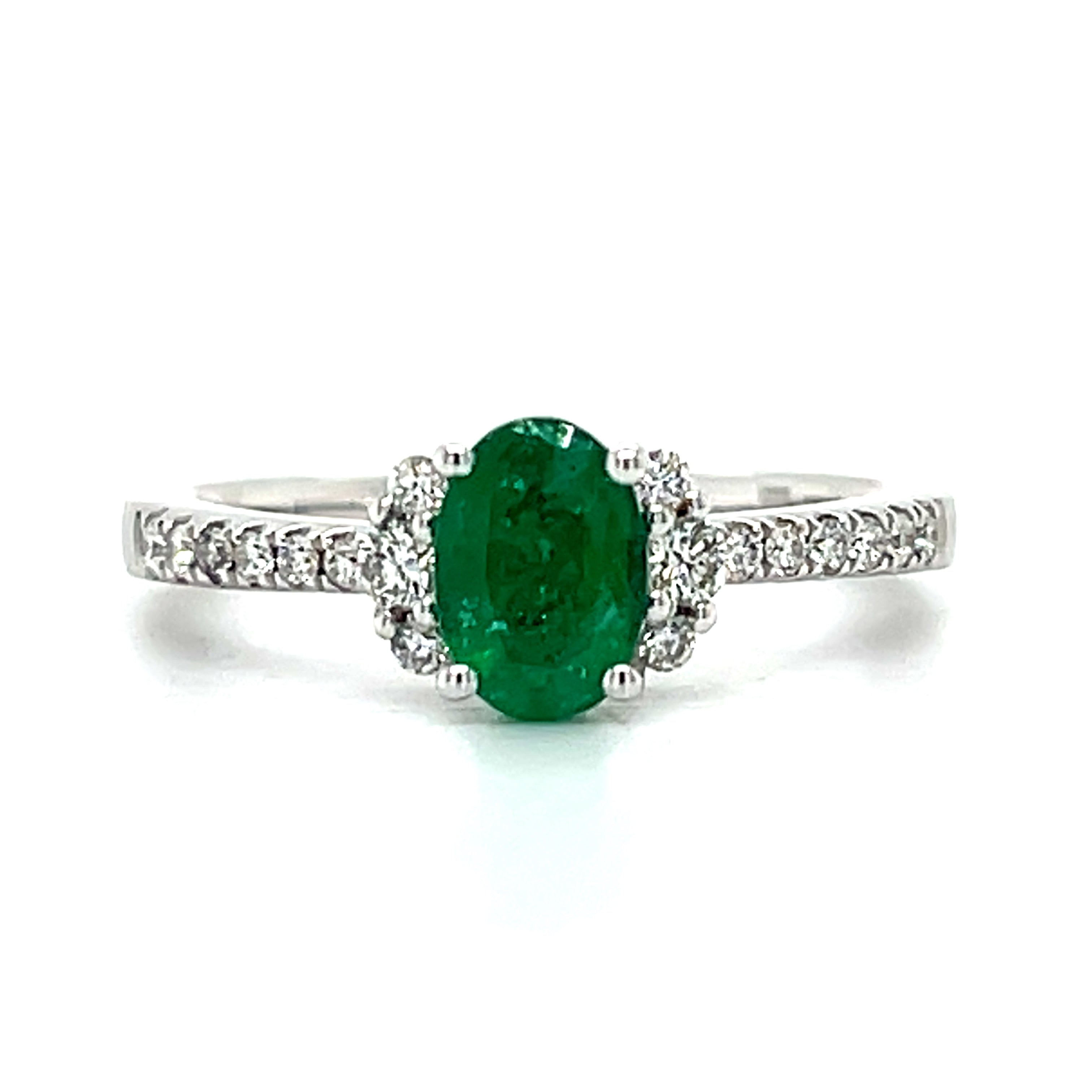 14K White Gold 0.69CT Oval Emerald and 0.24 Carat Total Weight (18) Round Diamond Ring