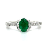 14K White Gold 0.69CT Oval Emerald and 0.24 Carat Total Weight (18) Round Diamond Ring