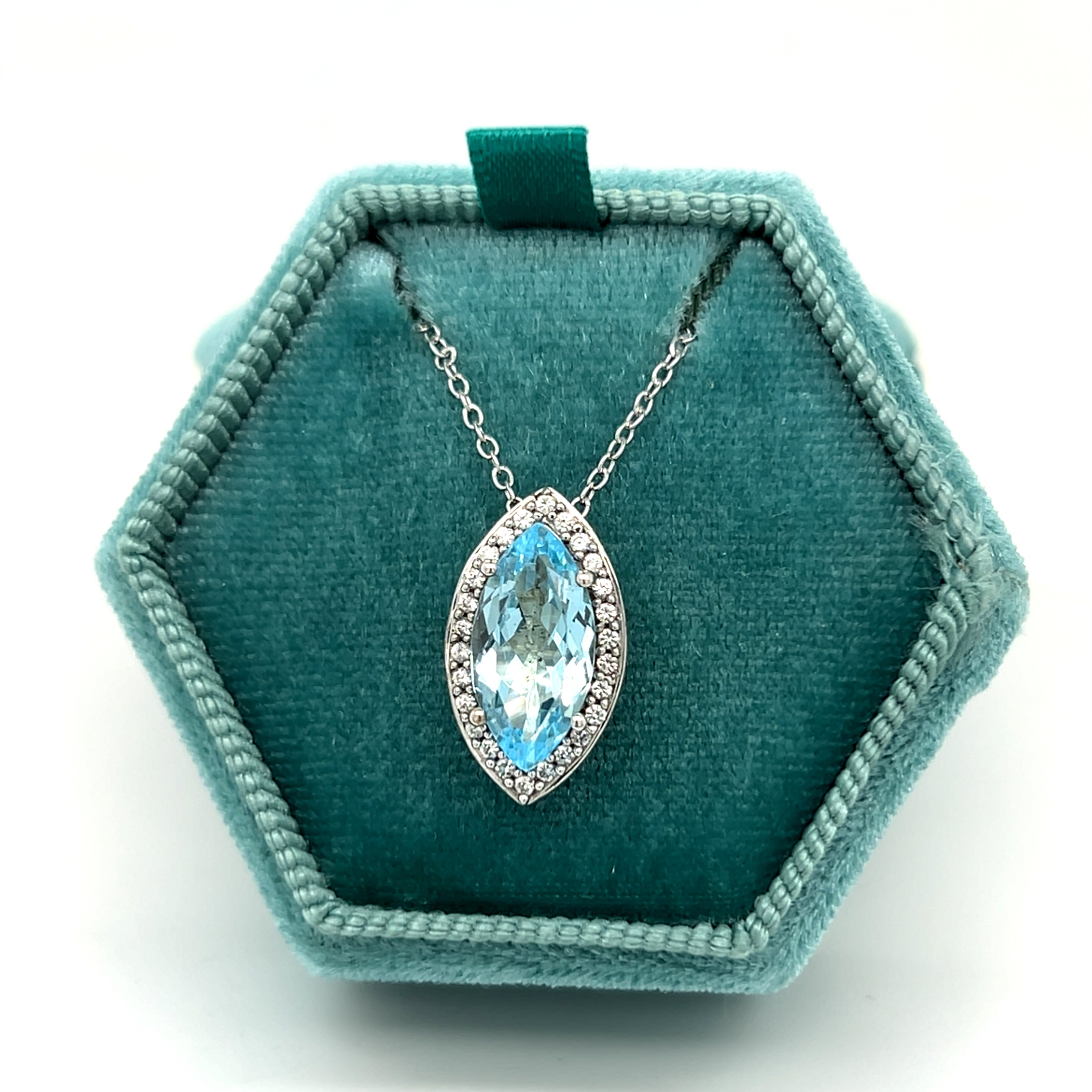 Sterling Silver 2.52CT Sky Blue Topaz and 0.31CTW White Cubic Zirconia Marquise Shaped Pendant Necklace