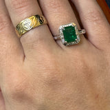 14K White Gold 2.25CT Emerald-Cut Emerald and 0.15 Carat Total Weight Diamond Ring.