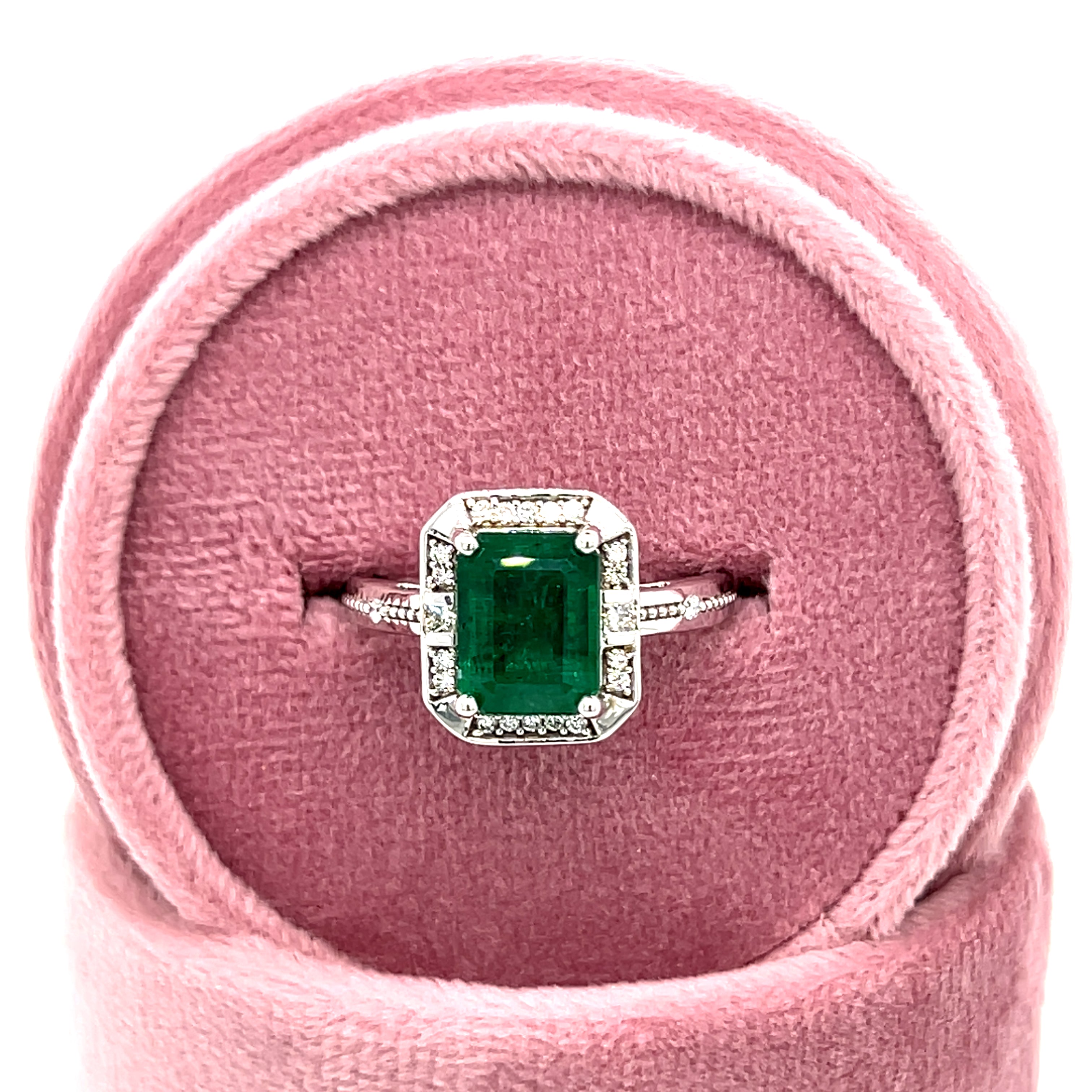 14K White Gold 2.25CT Emerald-Cut Emerald and 0.15 Carat Total Weight Diamond Ring.