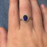 WJS Custom Set 14K White Gold 1.7 Carat Oval Lab Grown Blue Sapphire and 0.23 Carat Total Weight Lab Grown Diamond Ring with Floral/ Vintage Accents