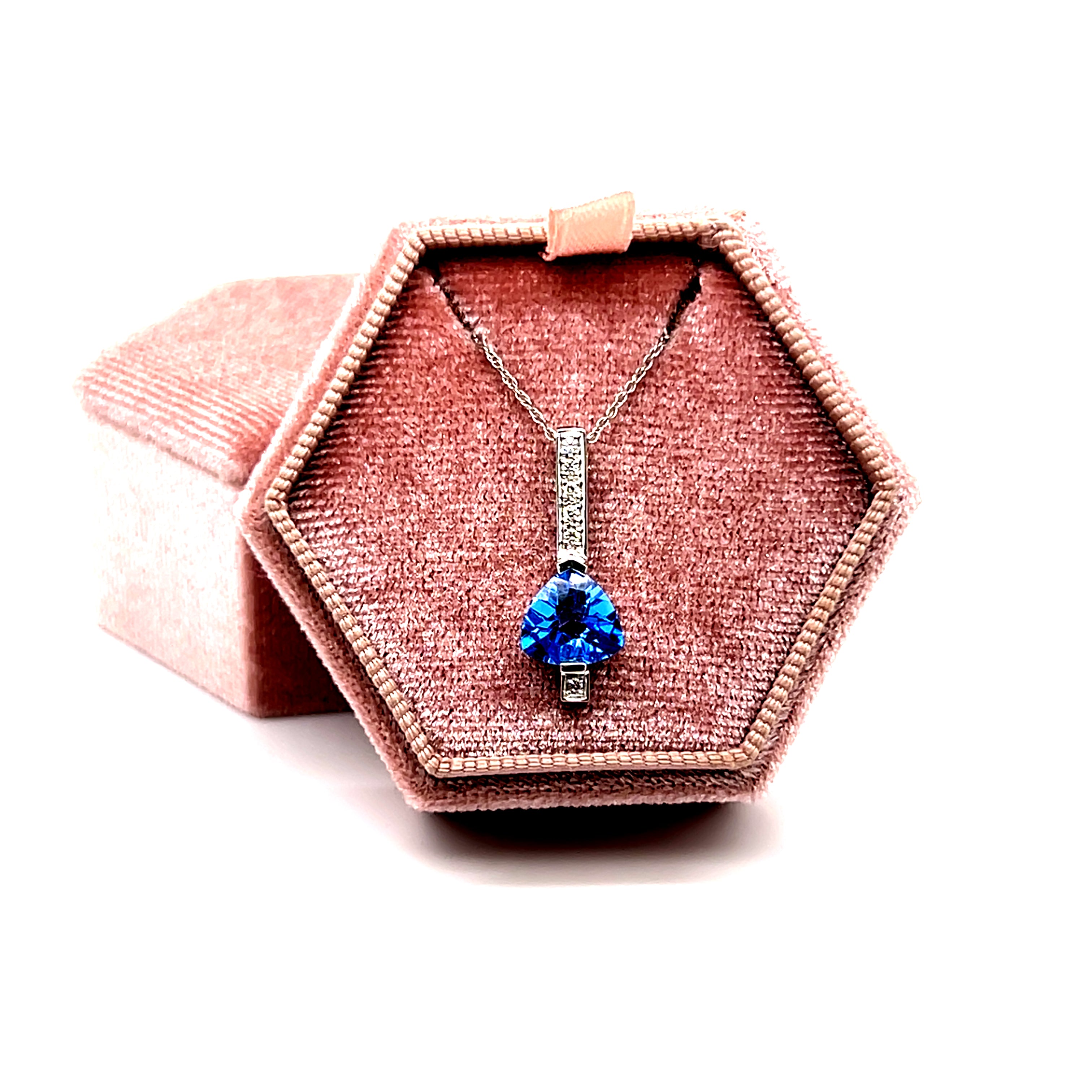 14K White Gold 2.07CT Trillion Glacier Blue Topaz and 0.054 Carat Total Weight (6) Diamond Pendant