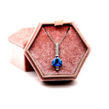 14K White Gold 2.07CT Trillion Glacier Blue Topaz and 0.054 Carat Total Weight (6) Diamond Pendant