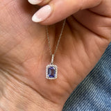 14K White Gold 0.92CT 5x7mm Emerald CutTanzanite and 0.105 Carat Total Weight (29) Diamond Pendant