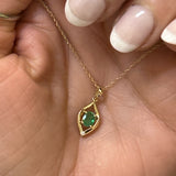14K Yellow Gold 0.25CT 4x5mm Oval Emerald and 0.007CT (1) Diamond Pear-Shaped Pendant