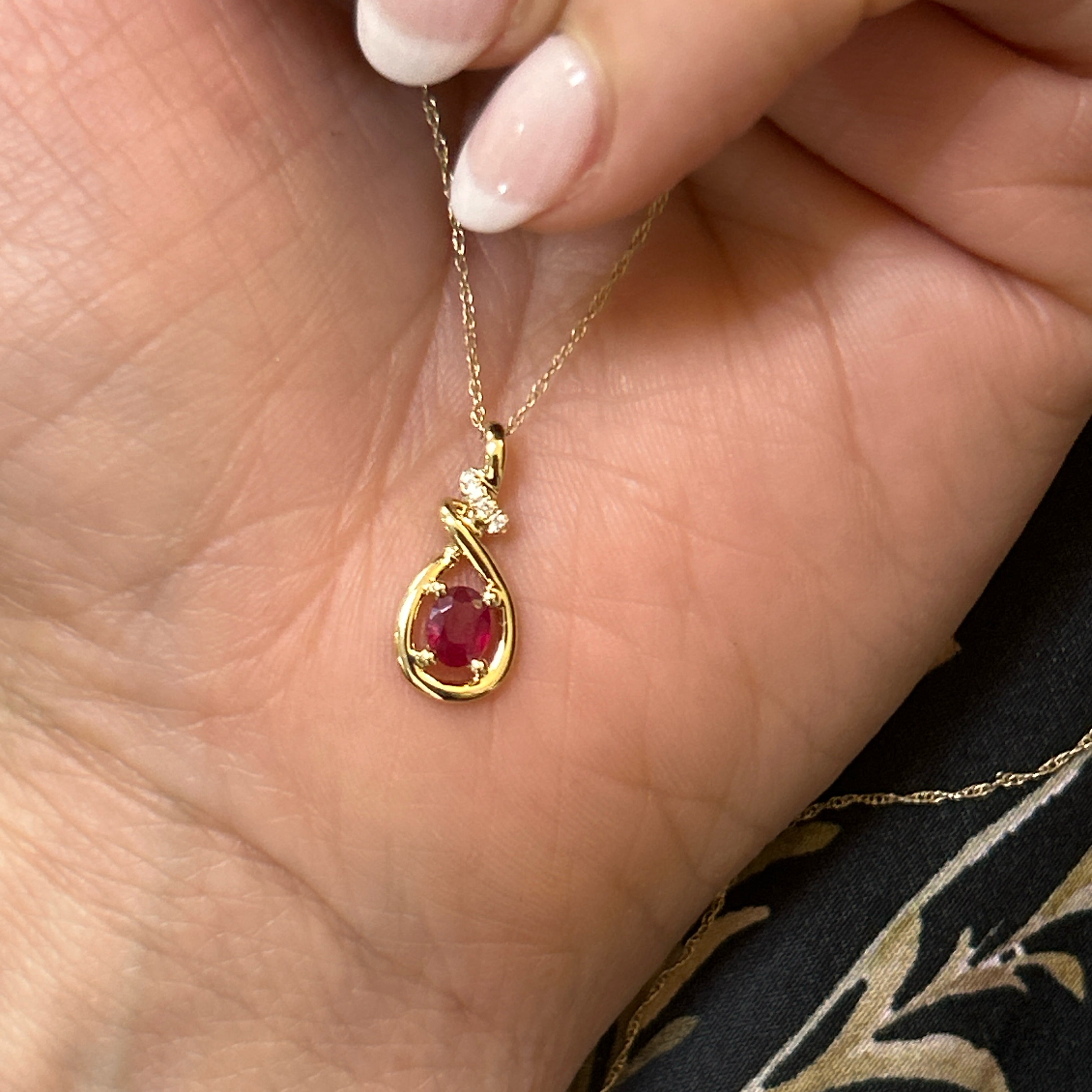 14K Yellow Gold 0.34CT 4x5mm Oval Ruby and 0.02 Carat Total Weight (4) Diamond Pendant